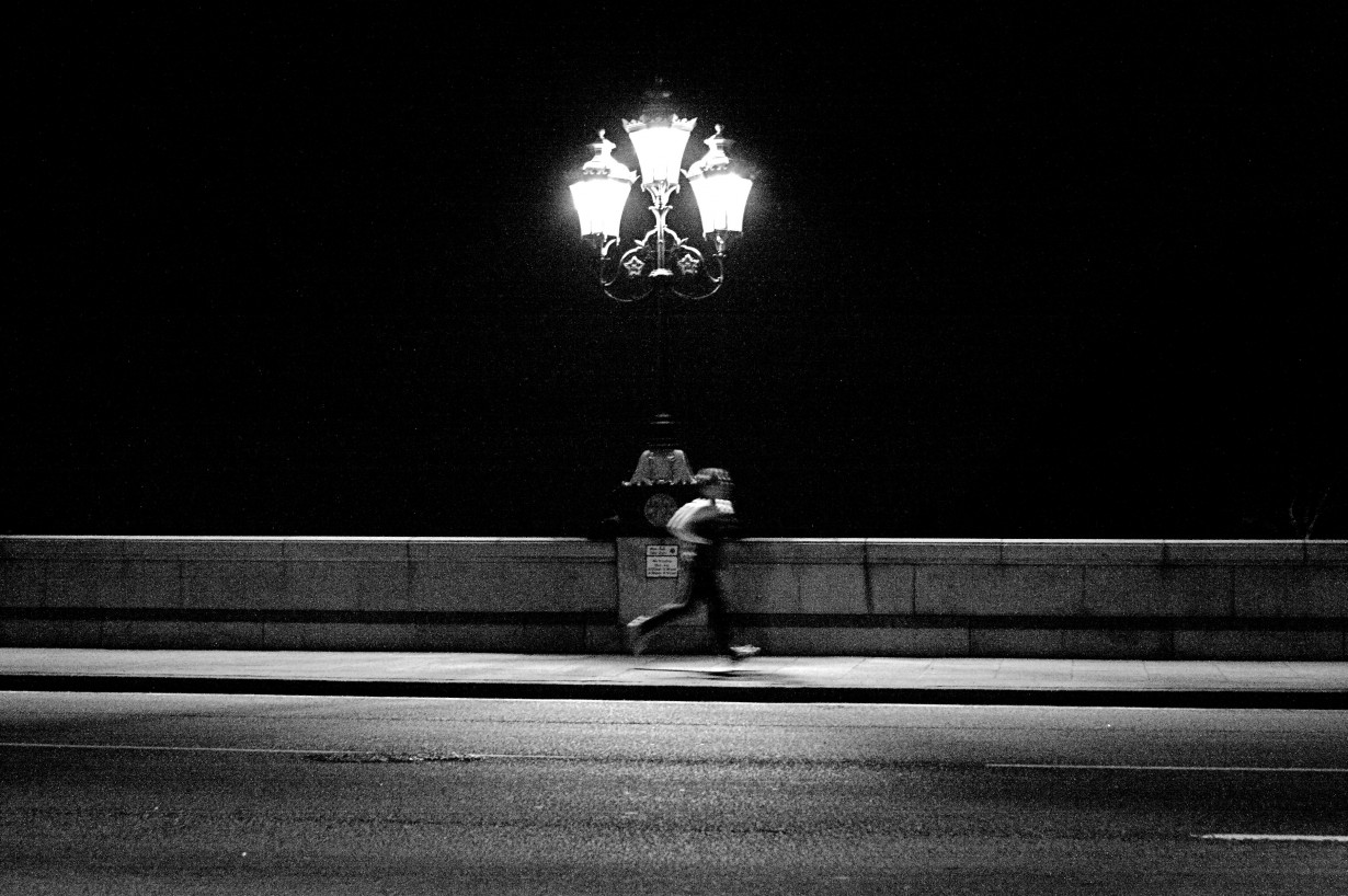 runner night street black and white