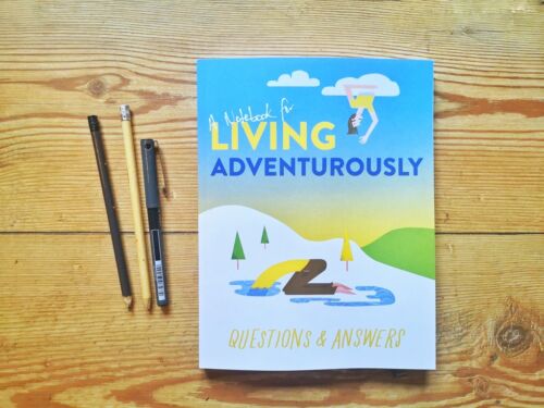 Books by Alastair Humphreys - A Notebook for Living Adventurously: Questions and Answers - Cover on Wooden Floor