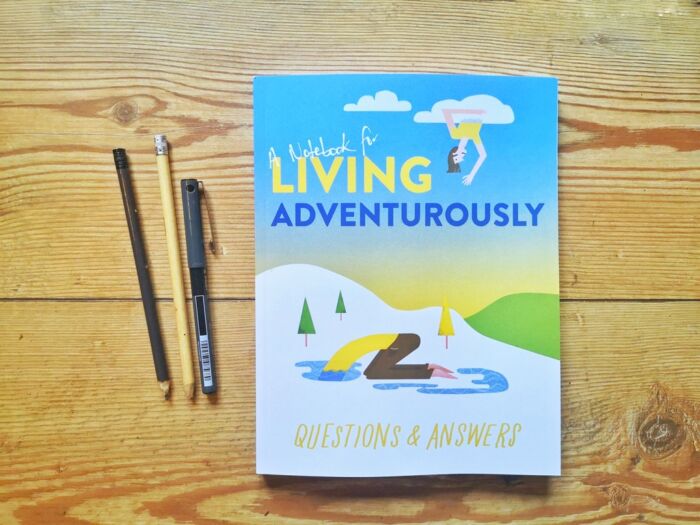 Books by Alastair Humphreys - A Notebook for Living Adventurously: Questions and Answers - Cover on Wooden Floor