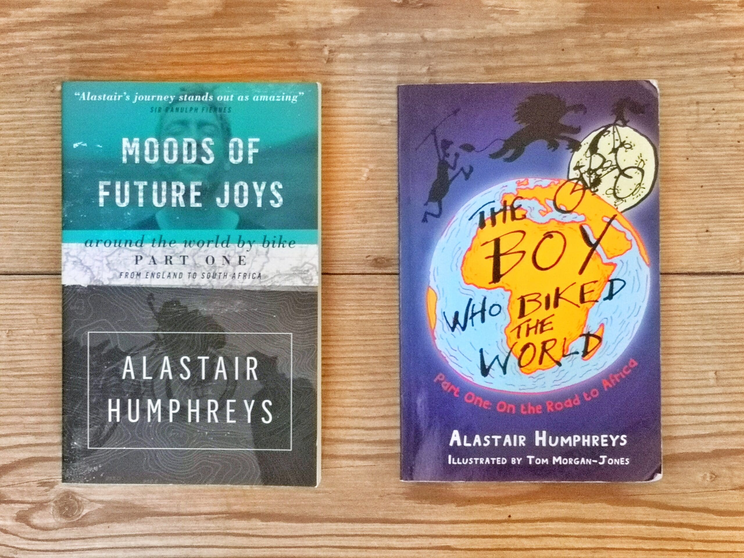 Books by Alastair Humphreys - Around the World Kids and Adults - Cover on Wooden Floor