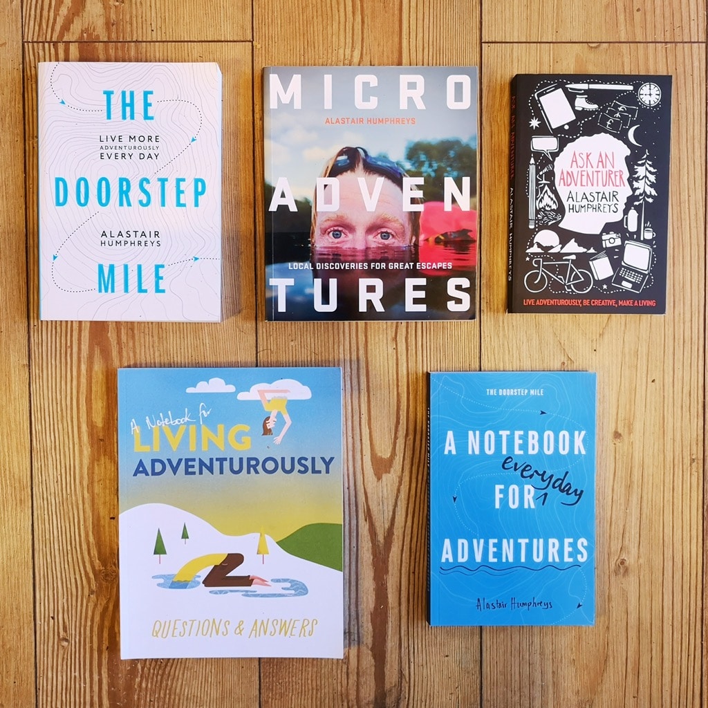 Books by Alastair Humphreys - Change Your Life Bundle with FREE notebooks - Cover on Wooden Floor