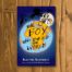Books by Alastair Humphreys - The Boy Who Biked the World: Part One: On the Road to Africa - Cover on Wooden Floor