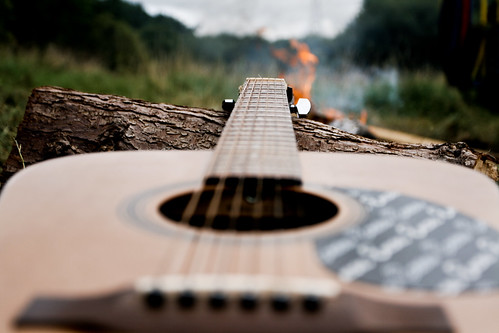 Guitar and camp fire