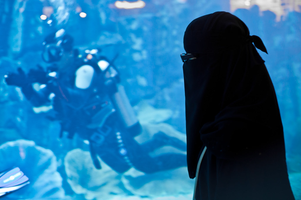 Muslim woman and scuba diver